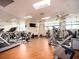 Bright gym features treadmills, stationary bikes, weights, and a mirrored wall, promoting health and wellness at 1520 Gulf Blvd # 1505, Clearwater Beach, FL 33767