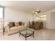 Inviting living room with a comfortable couch and table for entertaining at 1520 Gulf Blvd # 1505, Clearwater Beach, FL 33767