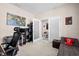 Carpeted office space with french doors and neutral colored walls at 1675 Bering Rd, Wesley Chapel, FL 33543