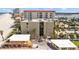 Beachfront condo building with ample parking and lush landscaping at 17710 Gulf Blvd # 304, Redington Shores, FL 33708
