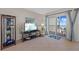 Comfortable living room with balcony access showcasing ocean views, perfect for relaxation at 17710 Gulf Blvd # 304, Redington Shores, FL 33708