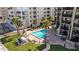 Aerial view of the outdoor pool and surrounding landscaped areas at 17710 Gulf Blvd # 304, Redington Shores, FL 33708