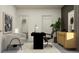 Well-lit office featuring modern furniture, including a desk, chairs, and storage at 18154 Serene Lake Loop, Lutz, FL 33548