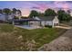 The house features a screened pool and an attached two-car garage at 18577 Clay Hill Rd, Dade City, FL 33523