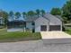 Exterior of the home showcasing a pool, screened-in patio, and attached two-car garage at 18577 Clay Hill Rd, Dade City, FL 33523