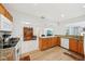 Spacious kitchen featuring modern appliances and an open layout with views to living room at 202 Grayson Ct, Sun City Center, FL 33573