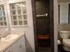 Bathroom featuring shower with a bench at 21103 Patio View Ct # 3302, Lutz, FL 33558