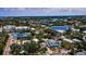 Community aerial view showing downtown Dunedin, marina, and Scotland Street, highlighting the location's features at 214 Scotland St, Dunedin, FL 34698
