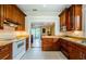 Well-equipped kitchen with custom cabinetry and granite countertops at 214 Scotland St, Dunedin, FL 34698