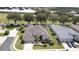 Charming single-story home with lush landscaping, a two-car garage, and a well-maintained lawn at 2146 Gold Dust Ct, Trinity, FL 34655