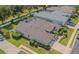 Aerial view of a charming house with manicured landscaping, mature trees, and a private driveway at 2146 Gold Dust Ct, Trinity, FL 34655