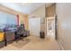 Bedroom featuring a vaulted ceiling, closet, and work space at 2146 Gold Dust Ct, Trinity, FL 34655