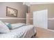 Bright bedroom featuring a vaulted ceiling and closet at 2146 Gold Dust Ct, Trinity, FL 34655
