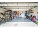 Spacious two-car garage with ample storage, offering plenty of room for vehicles and organizational solutions at 2507 Dewberry St, Valrico, FL 33596