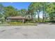 Community clubhouse with picnic tables, restrooms and other outdoor amenities at 2650 Countryside Blvd # A210, Clearwater, FL 33761
