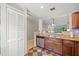 Open kitchen boasting stainless steel appliances, a tile backsplash, and ample cabinetry at 2650 Countryside Blvd # A210, Clearwater, FL 33761