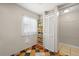 Pantry area with organized shelving and tile flooring, offering plenty of storage space at 2650 Countryside Blvd # A210, Clearwater, FL 33761