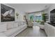 Serene living room showcasing modern decor, comfortable furnishings, and bright, natural light at 2700 Bayshore Blvd # 5210, Dunedin, FL 34698