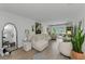Bright living room with stylish decor, wood-look tile flooring, and natural light at 2700 Bayshore Blvd # 5210, Dunedin, FL 34698