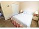 Cozy bedroom with a comfortable bed and closet for ample storage at 2826 Martha Ln, Land O Lakes, FL 34639