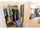 This walk-in closet maximizes storage space with shelving for shoes and hanging rods for clothing and belts at 2826 Martha Ln, Land O Lakes, FL 34639