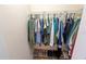 This organized walk-in closet provides ample storage with shelves for shoes and rods for hanging clothes at 2826 Martha Ln, Land O Lakes, FL 34639