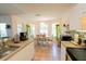 Bright kitchen with modern appliances, countertops, and open access to the dining area, perfect for cooking at 2826 Martha Ln, Land O Lakes, FL 34639
