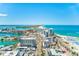 Breathtaking aerial view showcasing city buildings, a stunning shoreline, and inviting turquoise waters at 301 S Gulfview Blvd # 301, Clearwater Beach, FL 33767