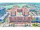 Beautiful aerial view of beachfront condo showing pool and stunning city views at 301 S Gulfview Blvd # 301, Clearwater Beach, FL 33767