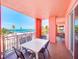 Spacious balcony with outdoor dining and stunning views of the beach and ocean at 301 S Gulfview Blvd # 301, Clearwater Beach, FL 33767