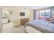 Bedroom with ensuite bath and balcony access at 301 S Gulfview Blvd # 301, Clearwater Beach, FL 33767
