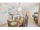 Inviting dining area adjacent to an open kitchen and living space, perfect for entertaining at 301 S Gulfview Blvd # 301, Clearwater Beach, FL 33767