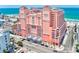 Stunning exterior shot of the hotel with ocean view, surrounded by beautiful scenery at 301 S Gulfview Blvd # 301, Clearwater Beach, FL 33767