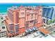 Stunning exterior shot of the hotel with ocean view, surrounded by beautiful scenery at 301 S Gulfview Blvd # 301, Clearwater Beach, FL 33767