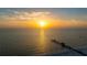 Wonderful overhead beach view of the coastline, water, and pier in view at 301 S Gulfview Blvd # 301, Clearwater Beach, FL 33767