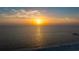 Gorgeous view of the beach and ocean reflecting the sun's warm light at 301 S Gulfview Blvd # 301, Clearwater Beach, FL 33767