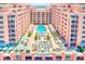 Gorgeous rooftop pool area with lounge chairs and ocean view at 301 S Gulfview Blvd # 301, Clearwater Beach, FL 33767
