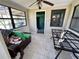 Sun room featuring tile floors and multiple windows at 314 Dickman Sw Dr, Ruskin, FL 33570
