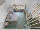 Overhead bedroom view showing spiral stairs, a large bed and bedside tables at 320 Island Way # 205, Clearwater Beach, FL 33767