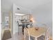 Inviting dining area with adjacent breakfast bar and bright kitchen space perfect for casual dining at 320 Island Way # 205, Clearwater Beach, FL 33767