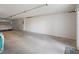 Oversized garage with car cover and abundant wall space at 320 Island Way # 205, Clearwater Beach, FL 33767