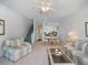 Spacious living area connects to the dining area and kitchen, creating a cohesive and open living space at 320 Island Way # 205, Clearwater Beach, FL 33767