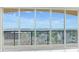 Balcony with expansive windows overlooking city and water views on a clear day at 345 Bayshore Blvd # 1813, Tampa, FL 33606