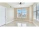 Bright bedroom with tile flooring, large windows, and a ceiling fan at 345 Bayshore Blvd # 1813, Tampa, FL 33606