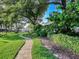 Landscaped walkway with lush greenery in a well-maintained community at 345 Bayshore Blvd # 1813, Tampa, FL 33606