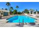 Sparkling community pool features a tile water feature and lush tropical landscaping at 345 Bayshore Blvd # 1813, Tampa, FL 33606