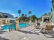 Inviting community pool with lounge chairs and manicured landscaping on a sunny day at 345 Bayshore Blvd # 1813, Tampa, FL 33606