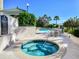 Inviting hot tub with spa rules posted near the pool with lush landscaping at 345 Bayshore Blvd # 1813, Tampa, FL 33606