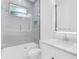 Elegant bathroom features a modern vanity, tub-shower combo, and stylish fixtures at 3616 W Anderson Ave, Tampa, FL 33611