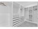 Well-organized walk-in closet with custom shelving, drawers, and ample storage space at 3616 W Anderson Ave, Tampa, FL 33611